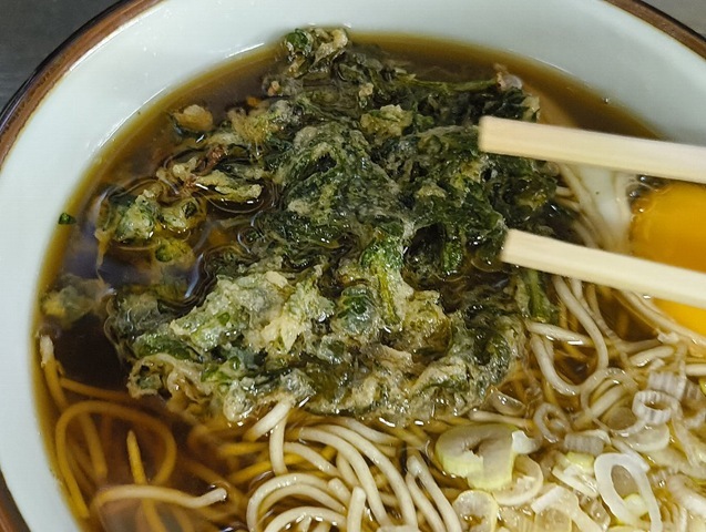 春菊天を汁に浸す