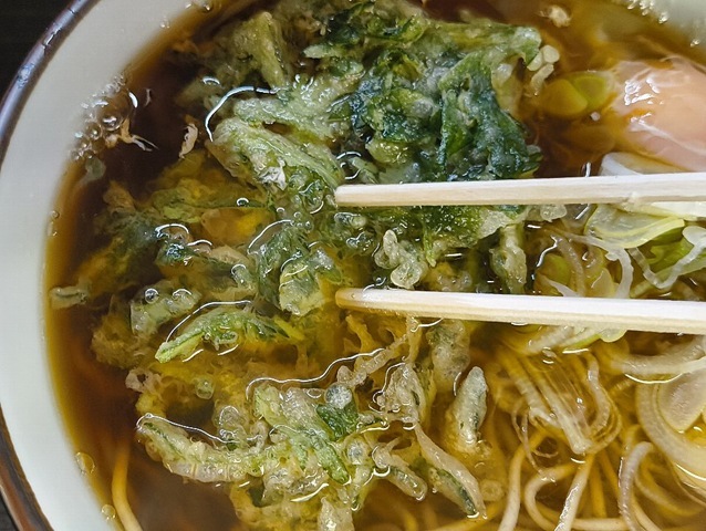 春菊天を汁に浸す